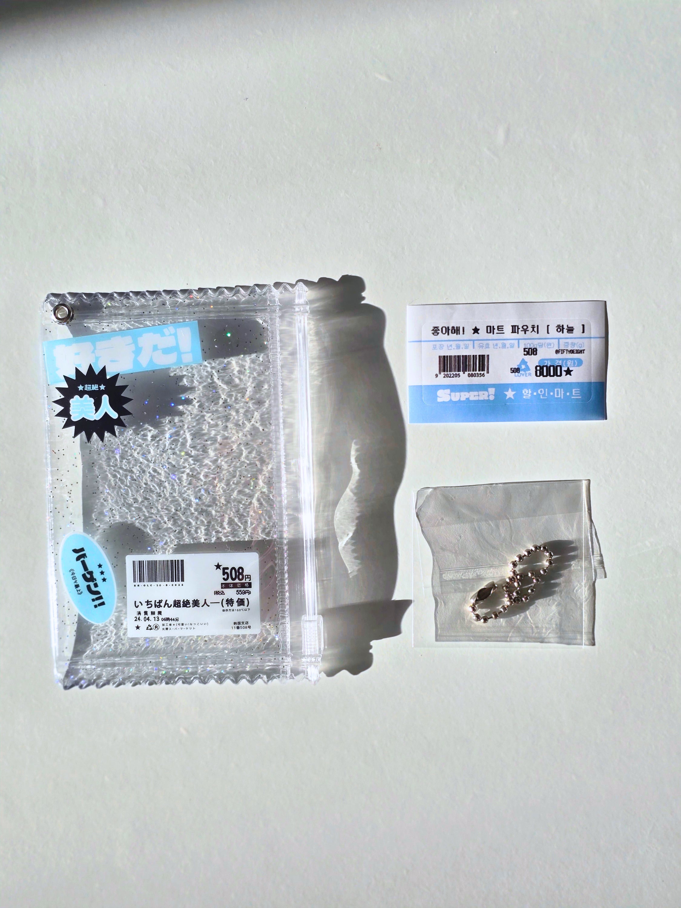 Transparenter Photocard Holder mit Grafik Sticker